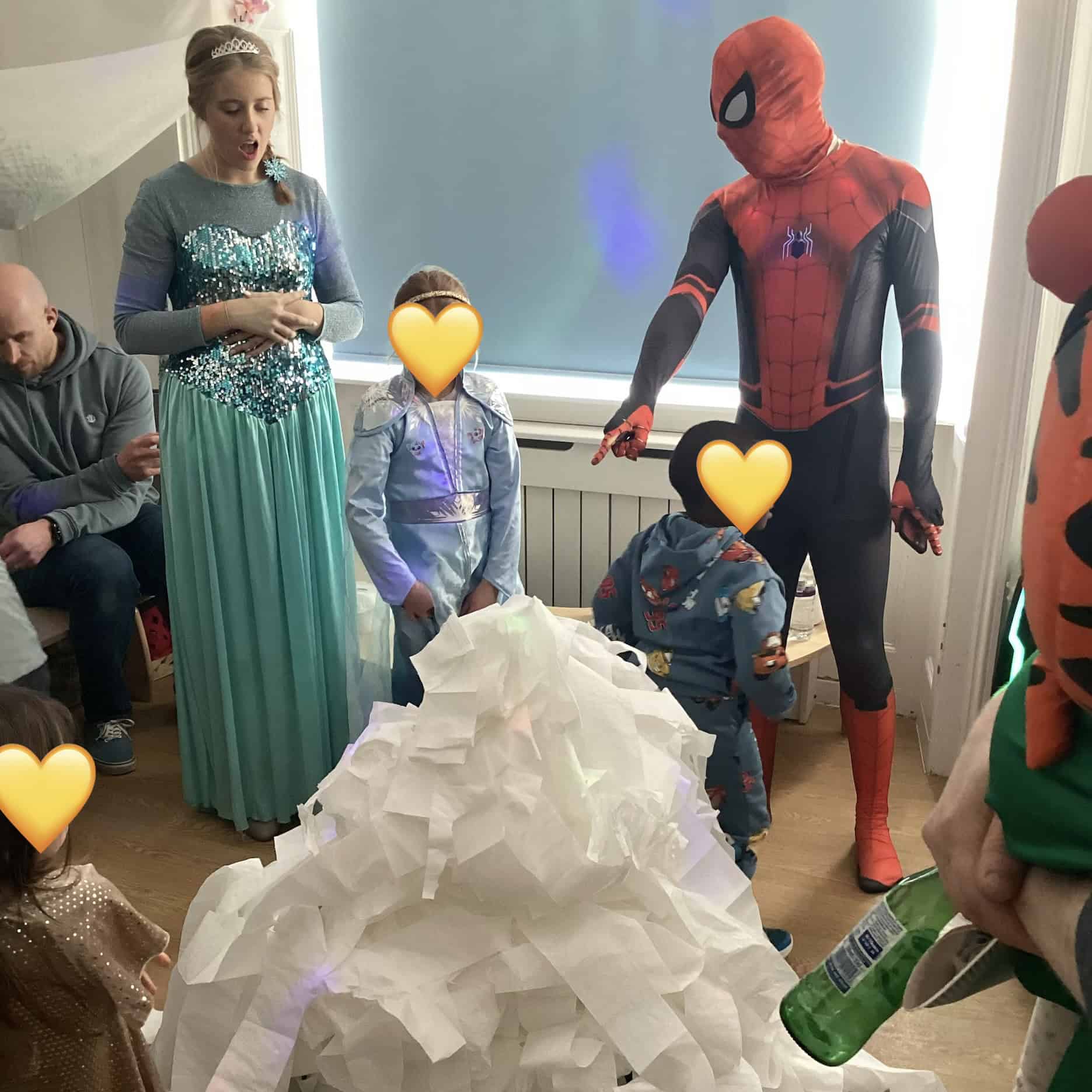 Children doing activity with Spiderman and Elsa